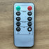 REMOTE CONTROL for flameless candles with timer and dimming features, perfect for setting ambiance.