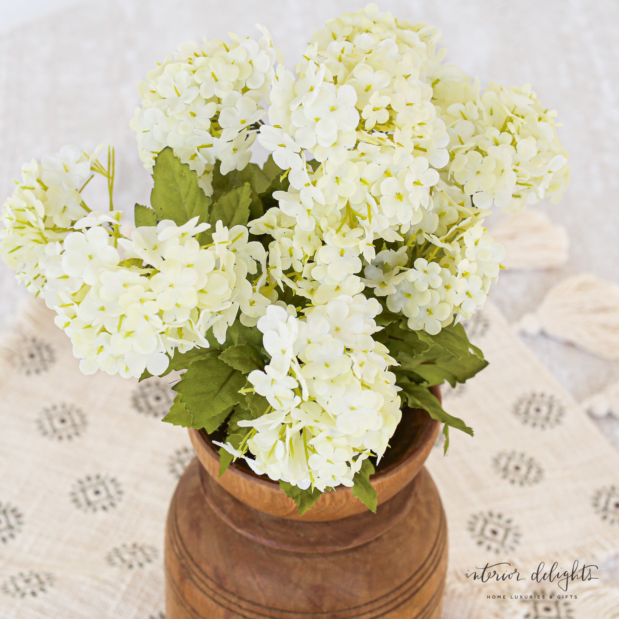 27" Snowball Spray arranged in a stylish vase, enhancing home decor.