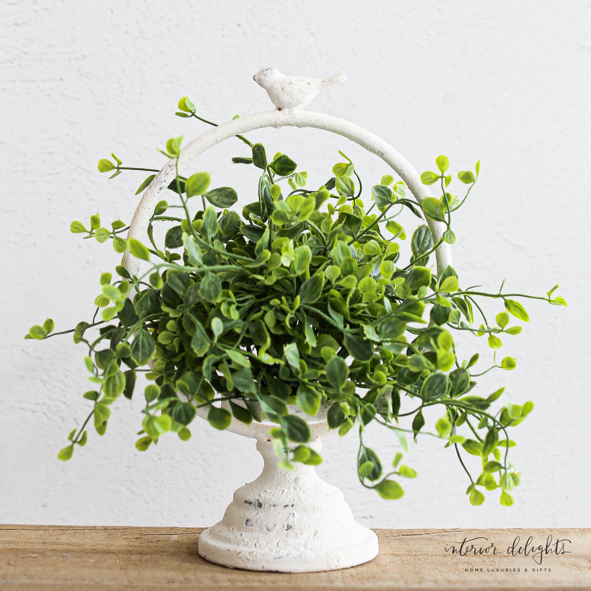 Stylish Meadowlark Stand, perfect for displaying a candle or small decor items.