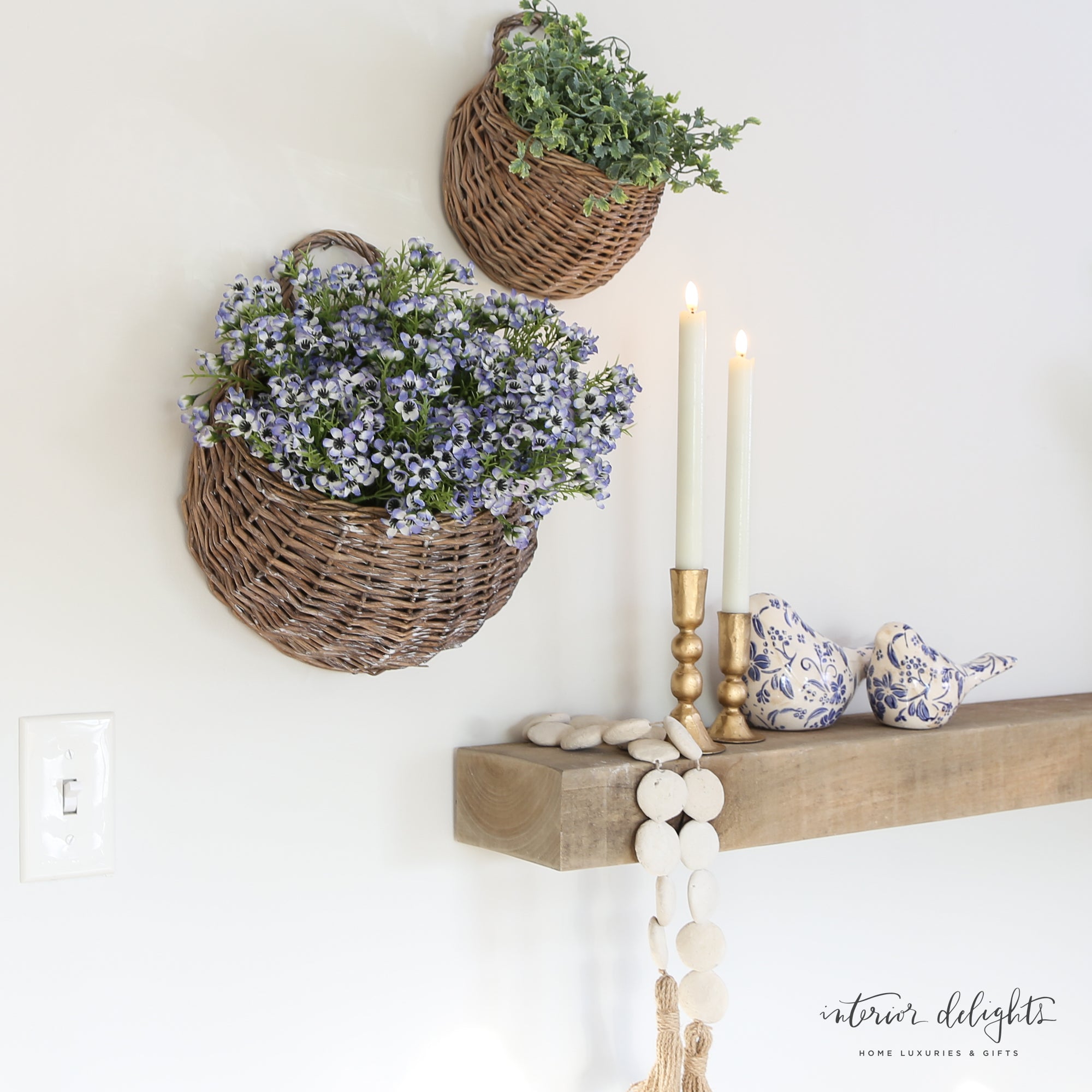 Ceramic Blue Floral Birds Set of 2, decorative accents with cream glaze and blue floral design, perfect for home decor on shelves or tabletops.