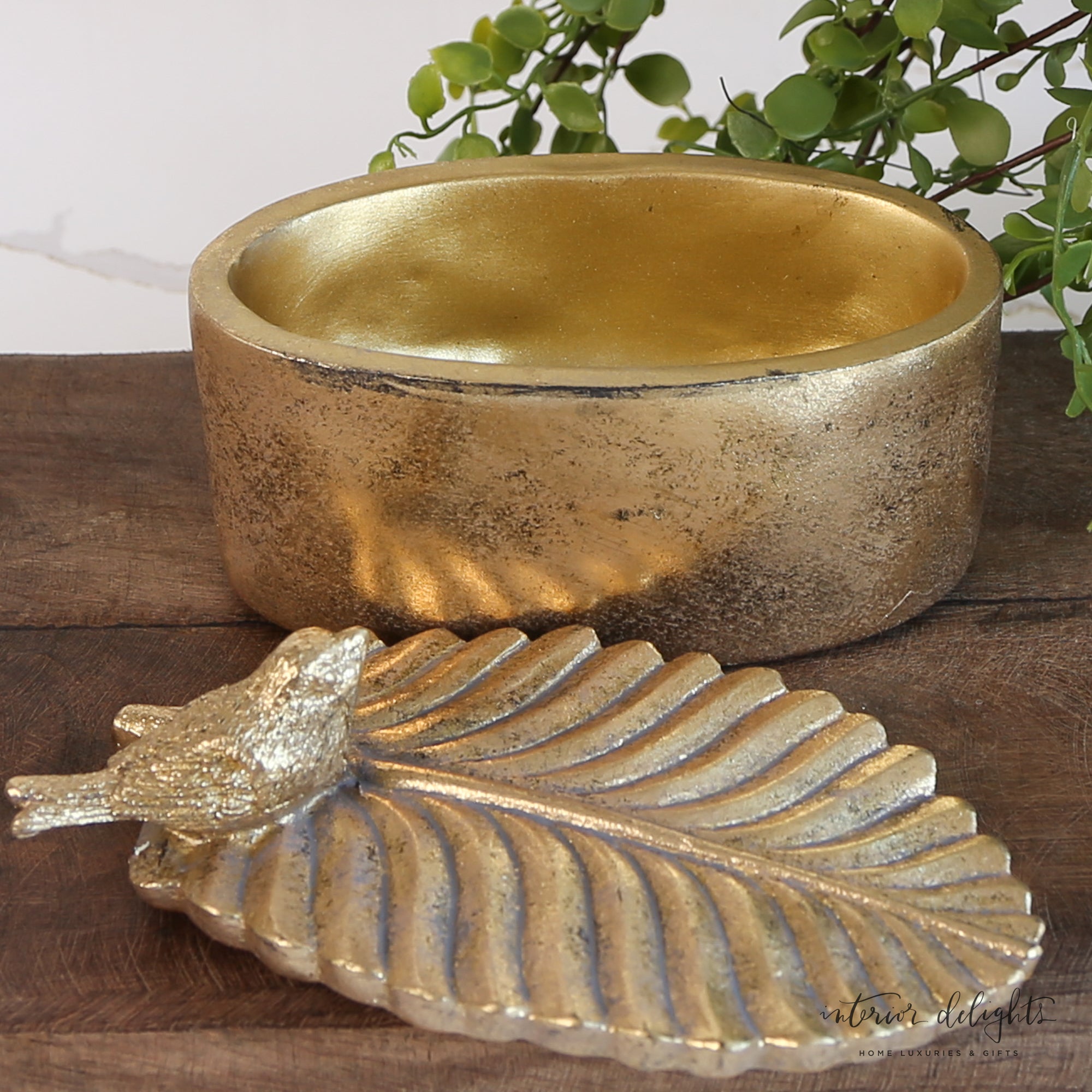 Charming Bird and Feather Trinket Box showcasing vintage-inspired design, perfect for tabletop decoration.