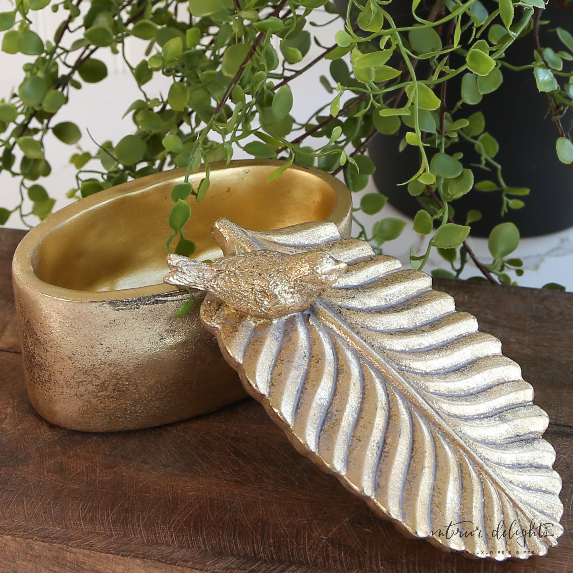 Elegant Bird and Feather Trinket Box featuring delicate design and vintage-inspired aesthetics.