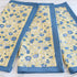 Meadows Blue and Gold Floral Tea Towels - Set of 3 featuring elegant floral designs, ideal for enhancing kitchen decor.