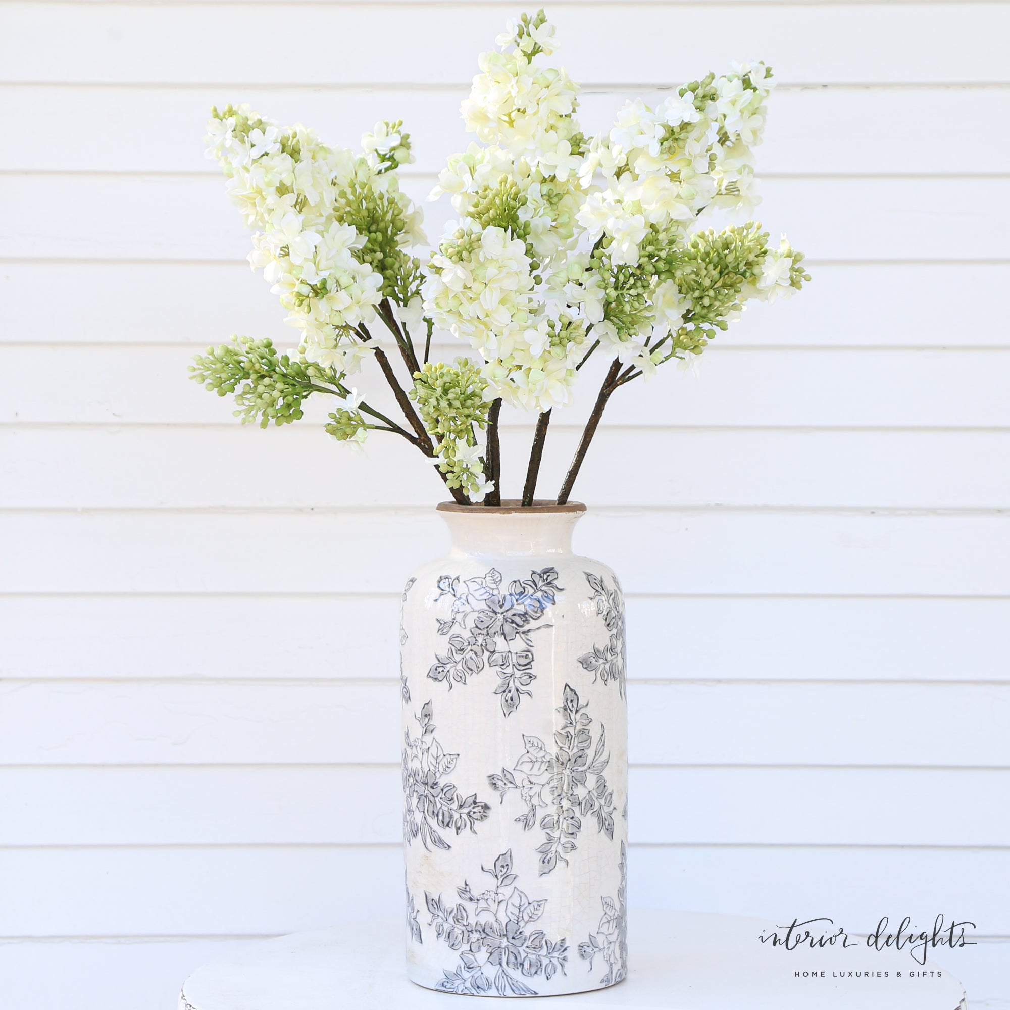 White Lilac Spray - A stunning faux stem with delicate white blooms and lively green buds, perfect for elegant arrangements.