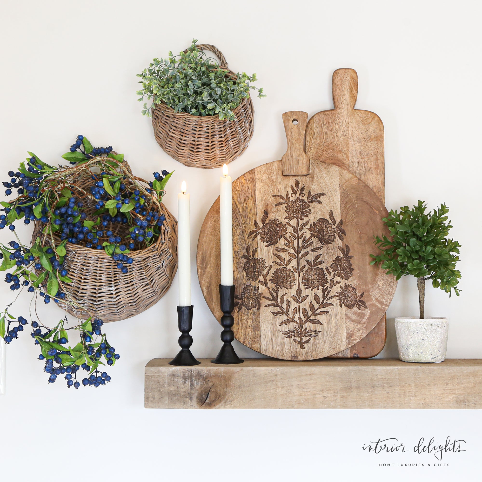 Decorative display of Blue Berry Hanging Vine in a white vase, perfect for adding a seasonal touch to decor.