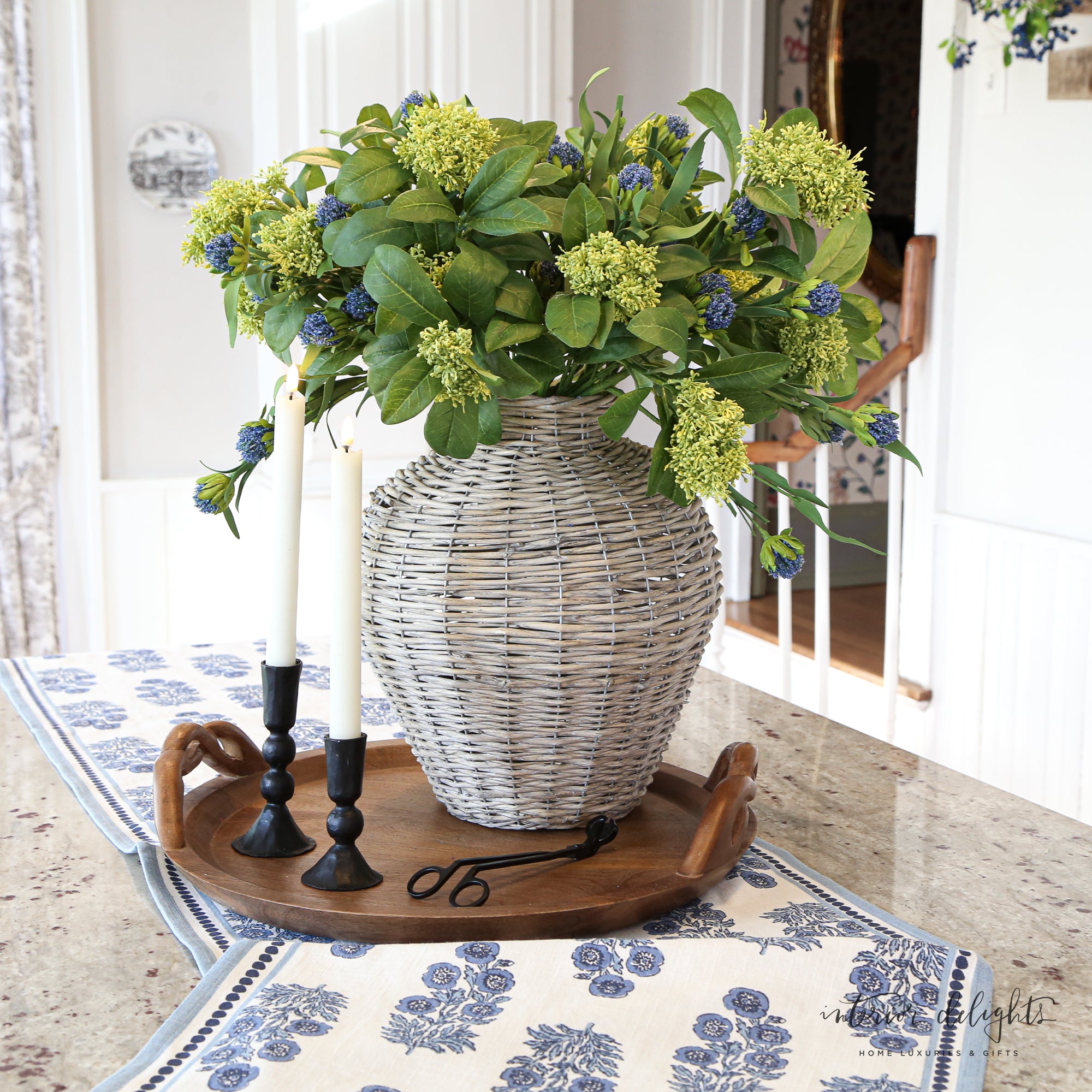A cozy arrangement featuring two Willow Vases (11” and 13.5”) showcasing their versatility and appeal in different decor styles, final sale clearance item.