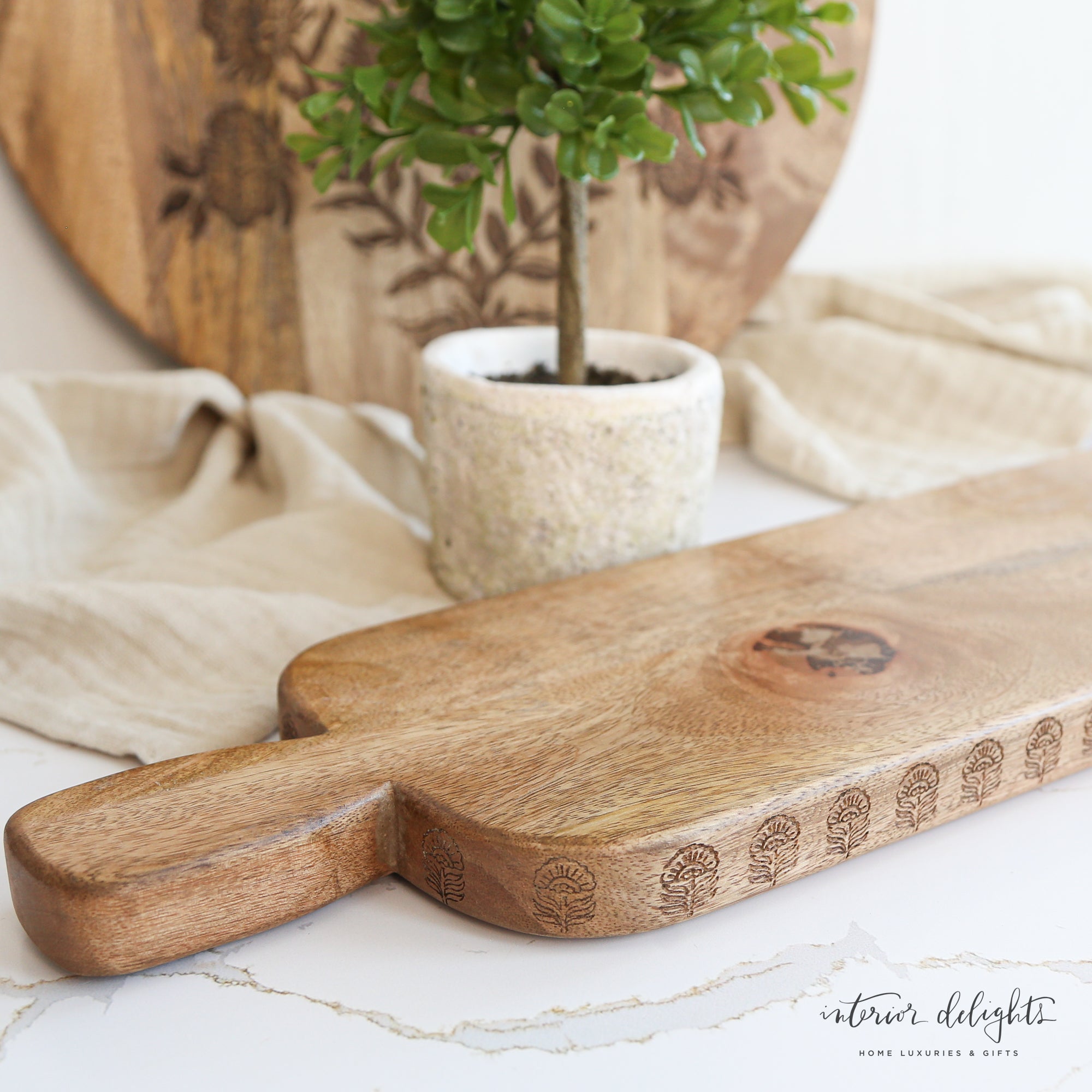 Elegant Long Board with Engraved Edge, highlighting the gorgeous wood finish and artistic details, ideal for enhancing your dining experience.