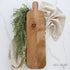 Long Board with Engraved Edge showcasing beautiful flower engravings, perfect for serving charcuterie and appetizers. Elegant design and artisan charm for kitchen or dining decor.
