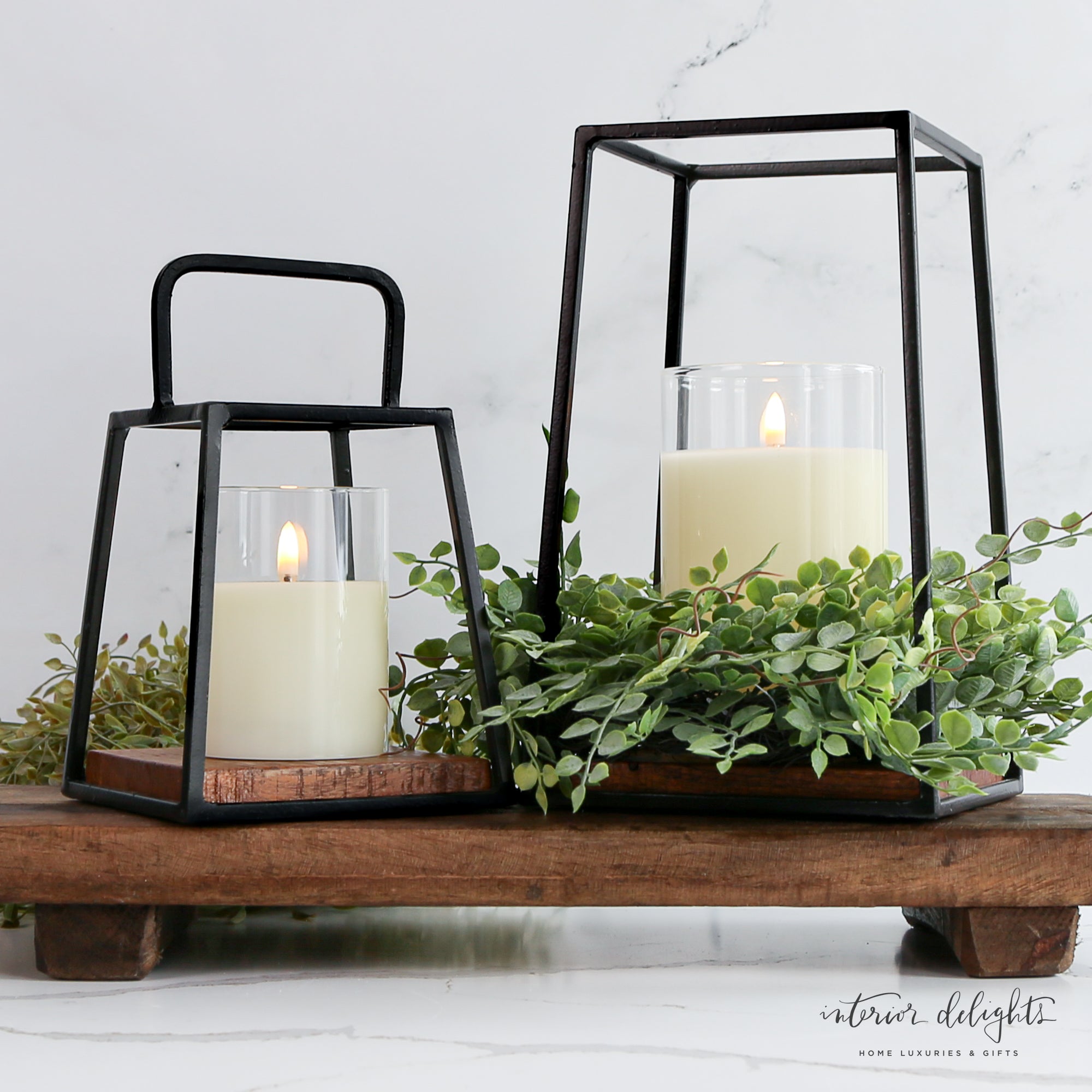 Mini Lantern Set displayed with seasonal greenery, showcasing their charm.