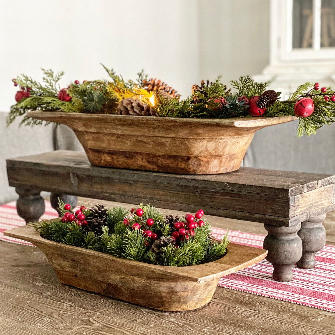 Rustic Footed Wood Riser displayed in a decorative setting, emphasizing its ideal use for centerpieces or mantel decorations.