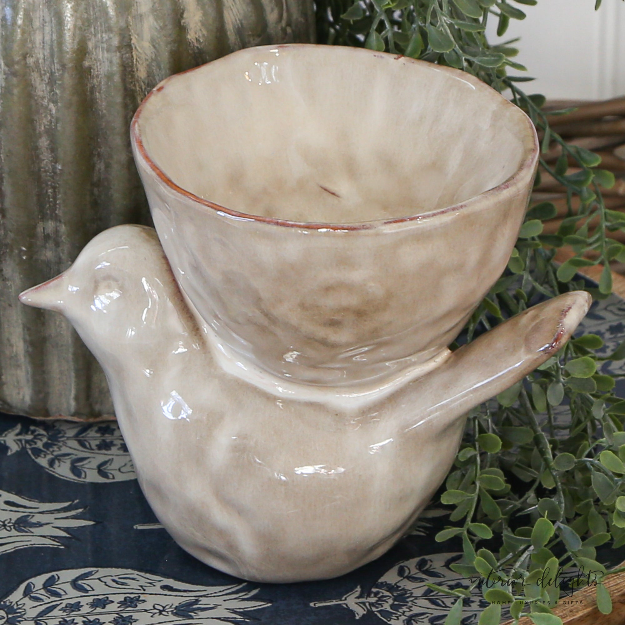 Closeup of the Stoneware Bird with Bowl - Cream, showcasing its glazed finish and elegant design.