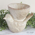 Stoneware Bird with Bowl - Cream, a charming decorative bird holding a bowl, perfect for rustic home decor.