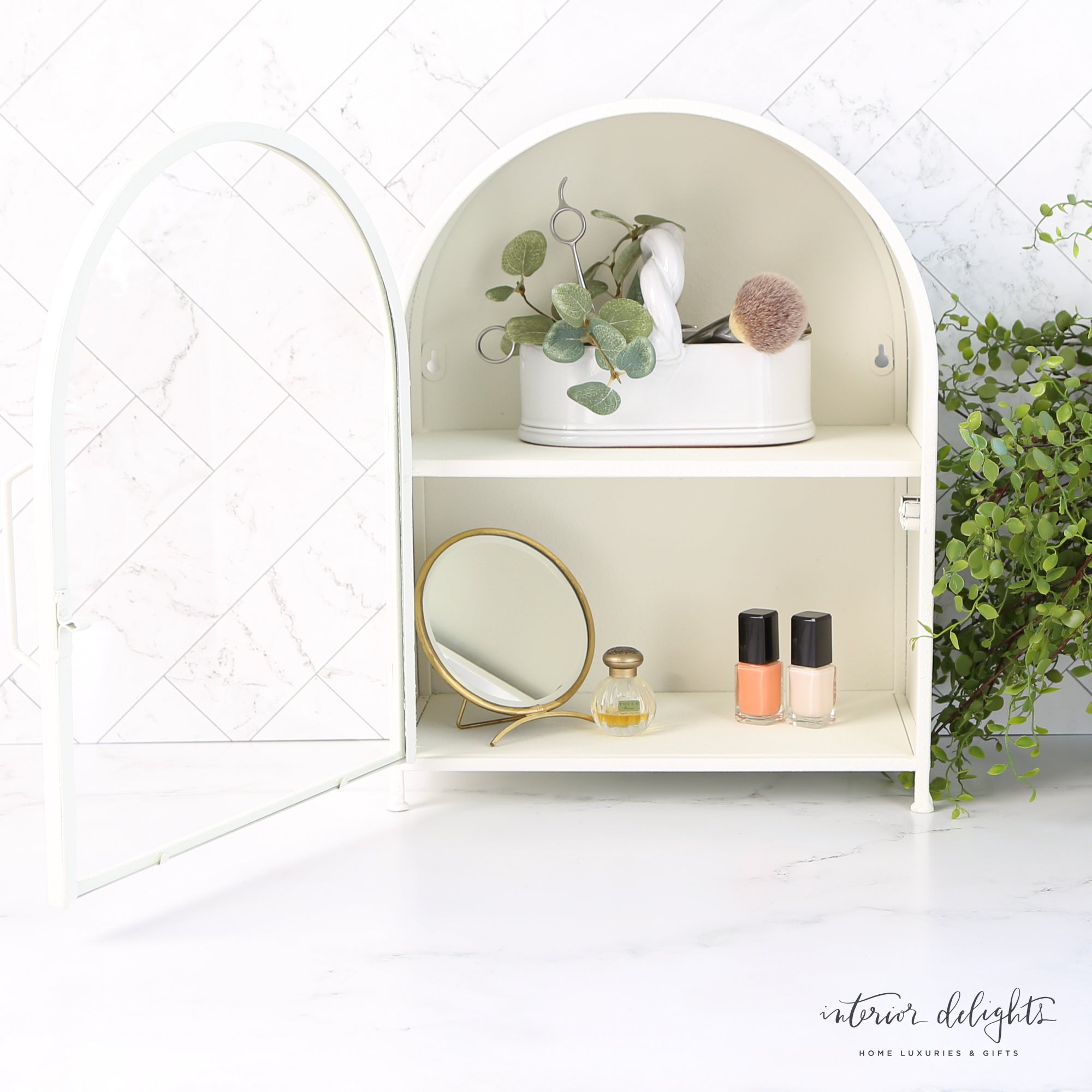 Close-up of the Round Antique Brass Mirror highlighting its elegant details and compact size of 5" D x 5.5" H, perfect for stylish home decor.