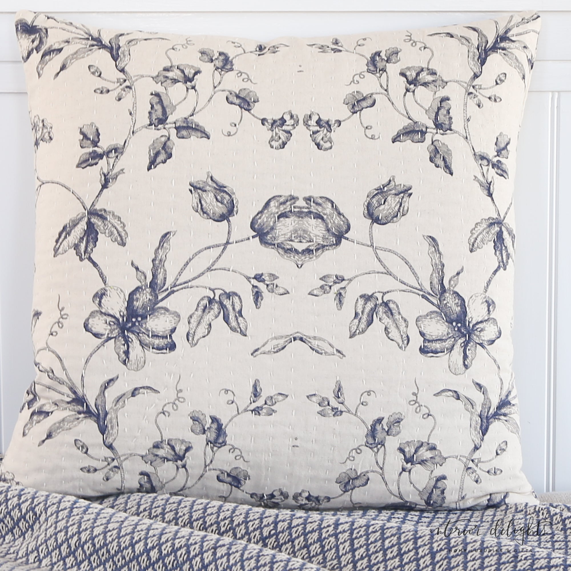 Close-up of the Cotton and Linen Square Pillow showcasing the soft texture and floral design.