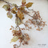 Berry Hanging Spray - 31" showcasing clusters of delicate berries in muted fall tones, perfect for autumn decor.