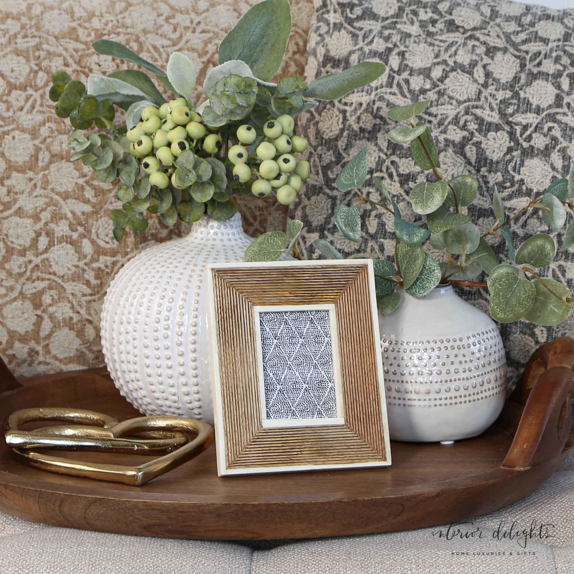 Elegant Hand-Carved Mini Photo Frame with Bone Border on a tabletop, adding warmth and sophistication to your home decor.