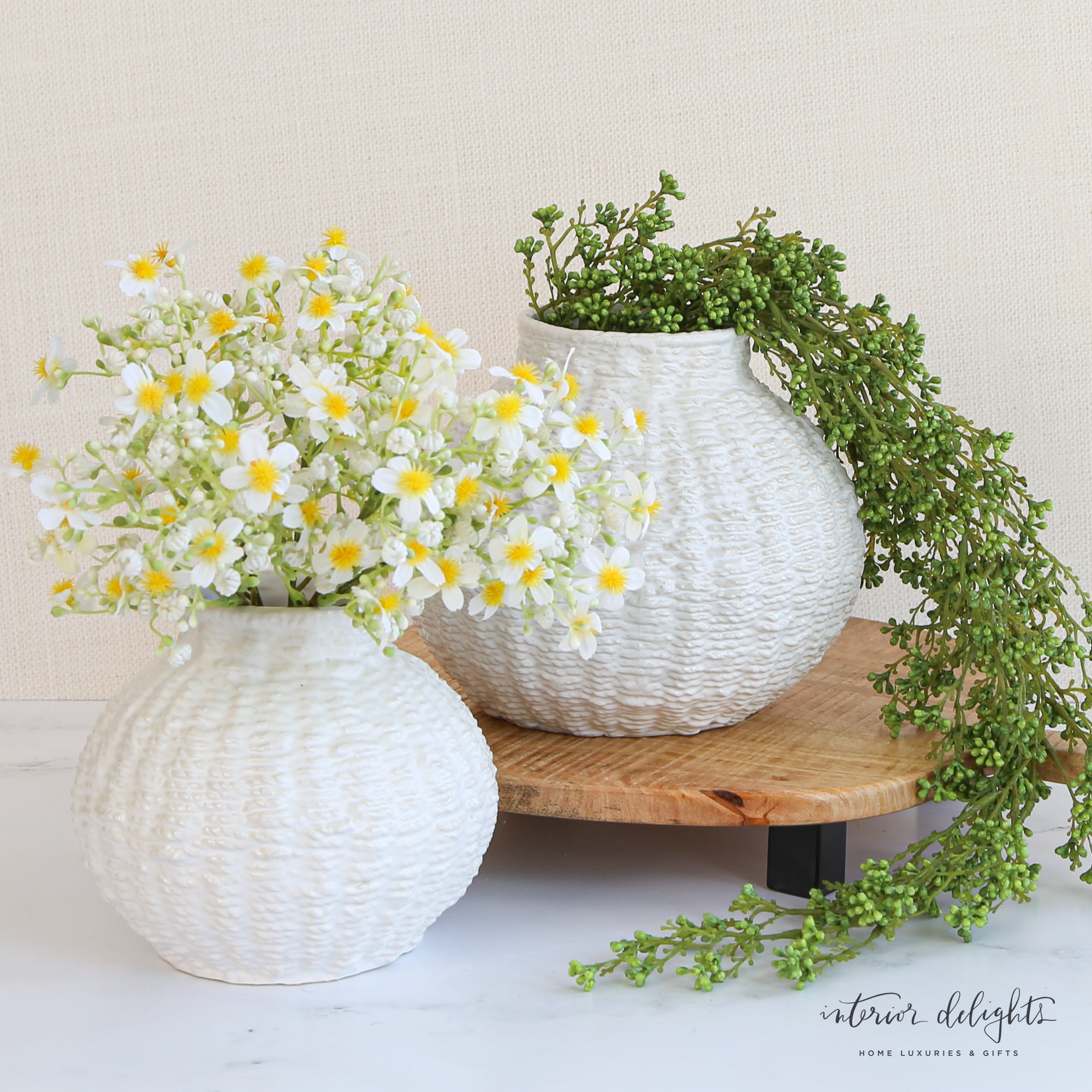 Stylish 6” or 7” Woven Ceramic Round Vases adding charm and texture to a cozy living room setting.