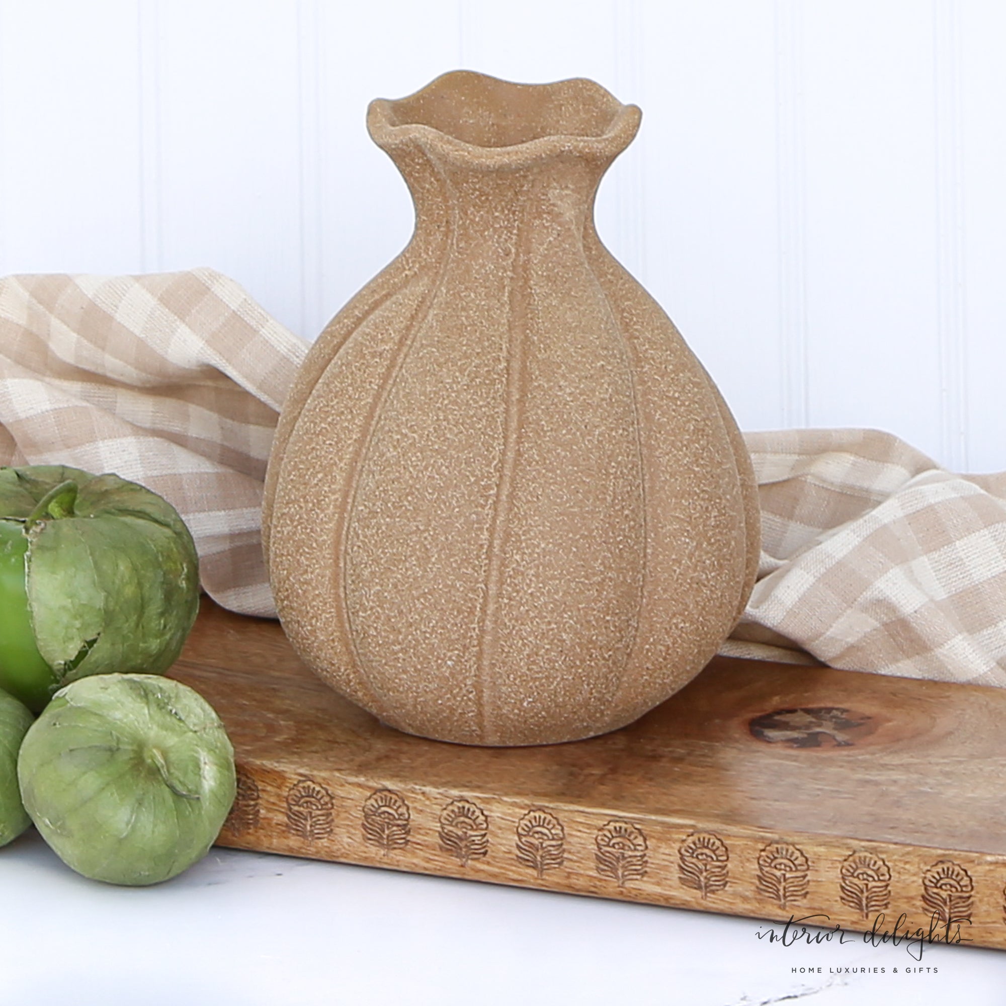 Close-up of the 7” Brown Stoneware Vase highlighting its unique earthy tone and textural details.
