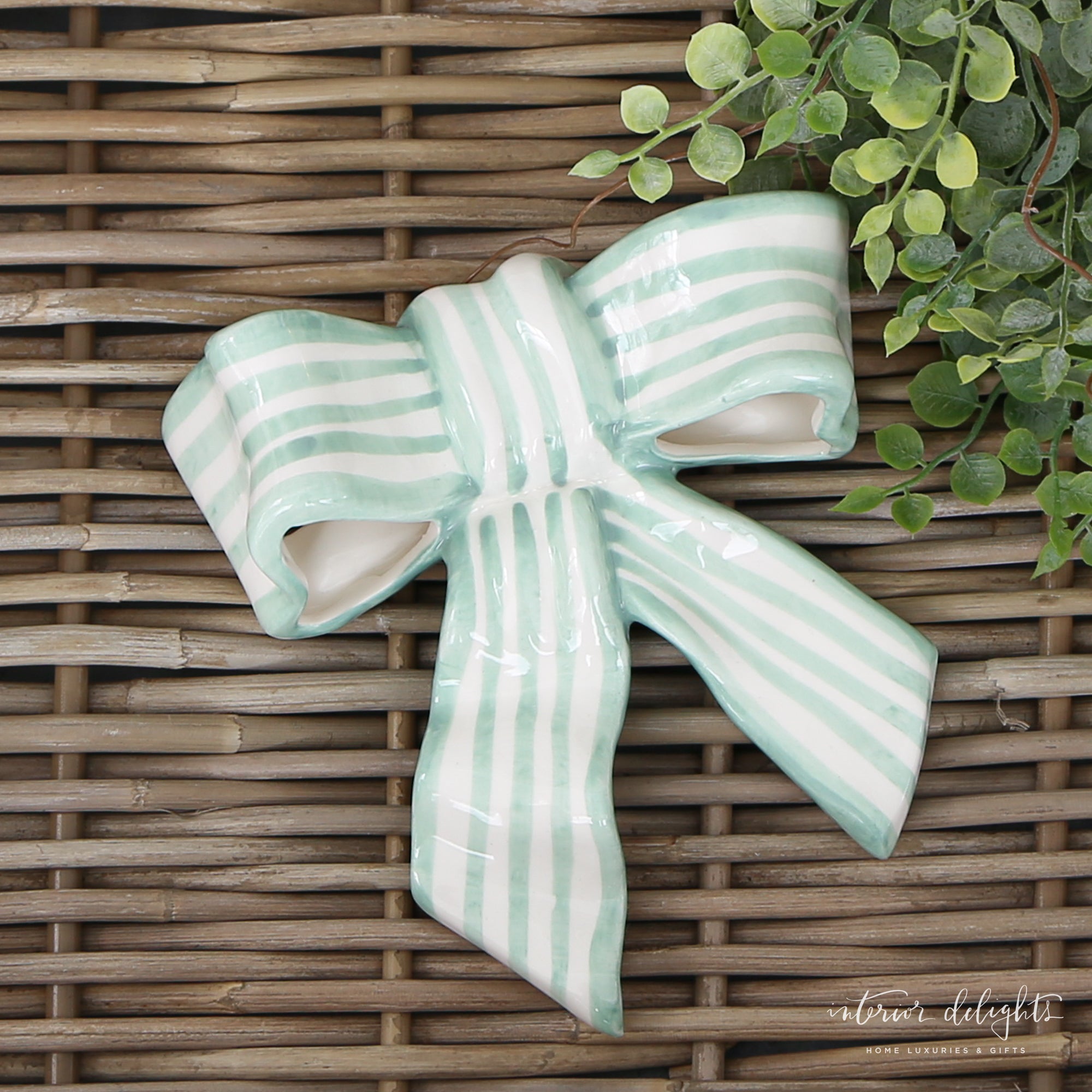 Stoneware Striped Bow in green and white featuring a glossy finish and playful striped pattern, perfect for home decor and functional accents.