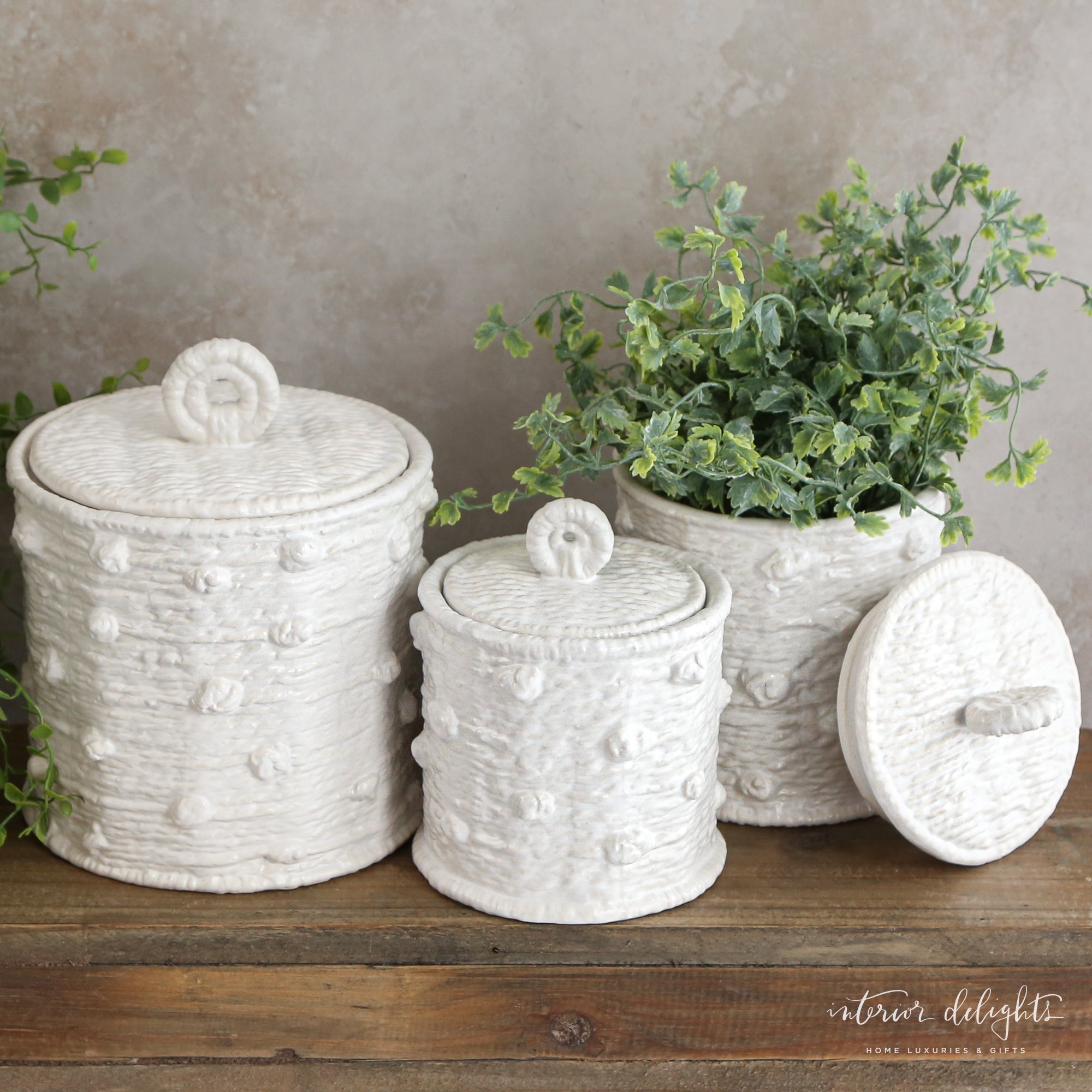 Knotted Canister Set displayed in a modern kitchen, perfect for storing kitchen essentials or bathroom supplies.