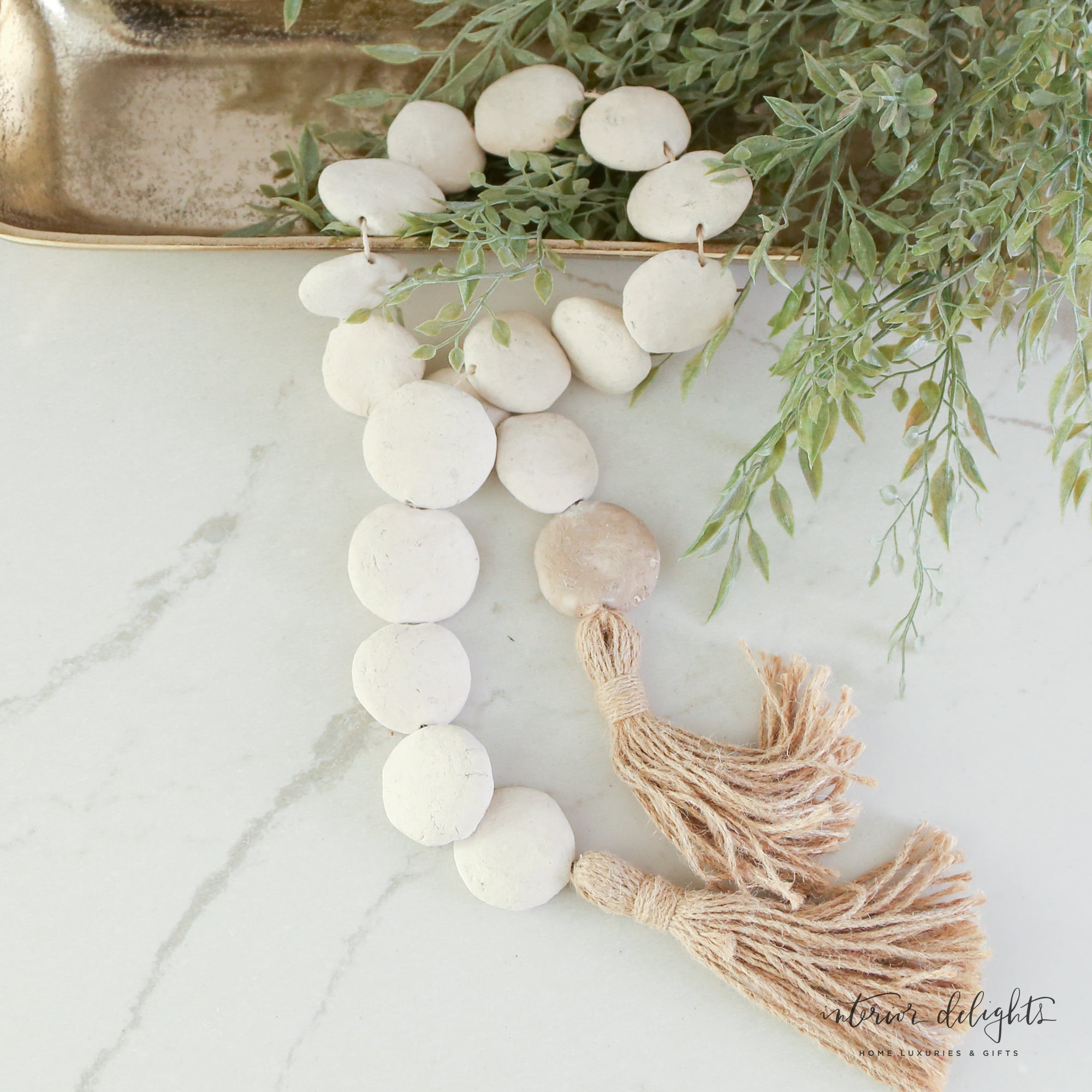 Natural Textured Flat Bead Garland - 35in featuring uniquely shaped beads with neutral tones and natural color variations.