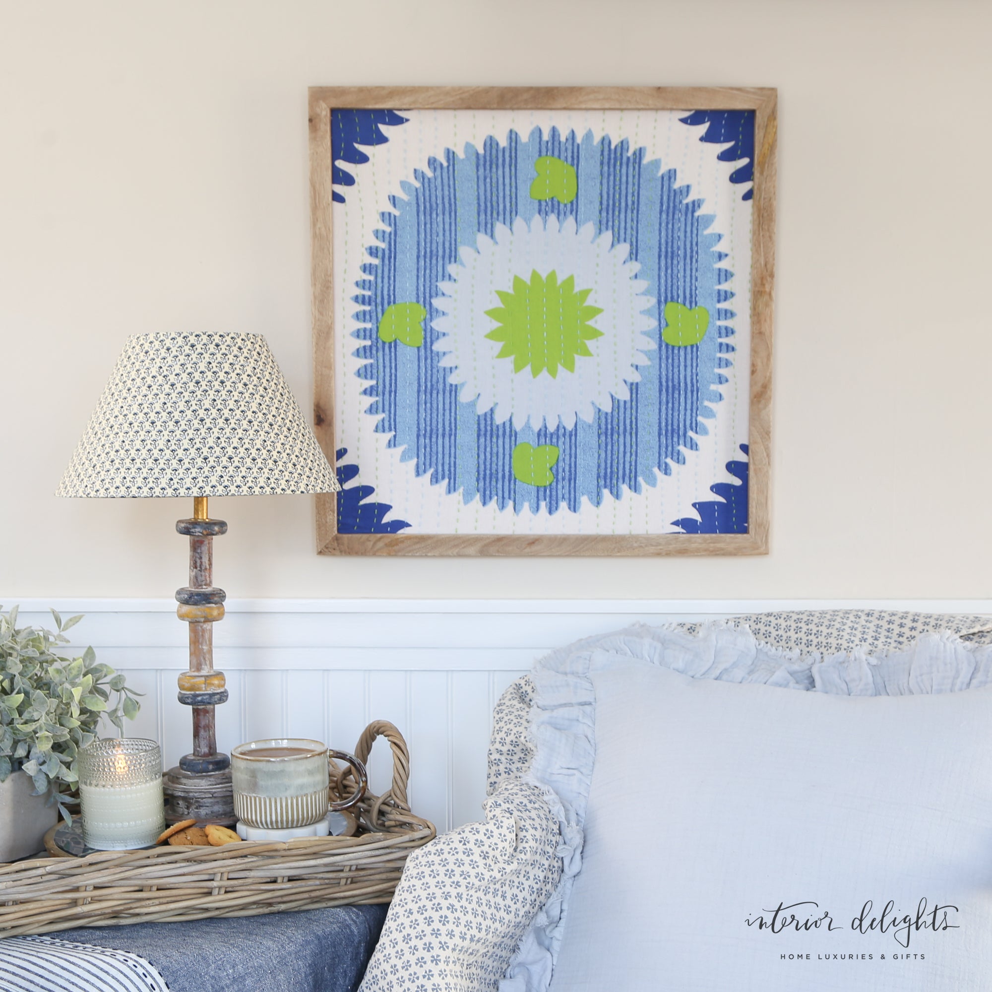 Wooden Spool Table Lamp with a blue and natural block print patterned fabric shade, adding vintage style.