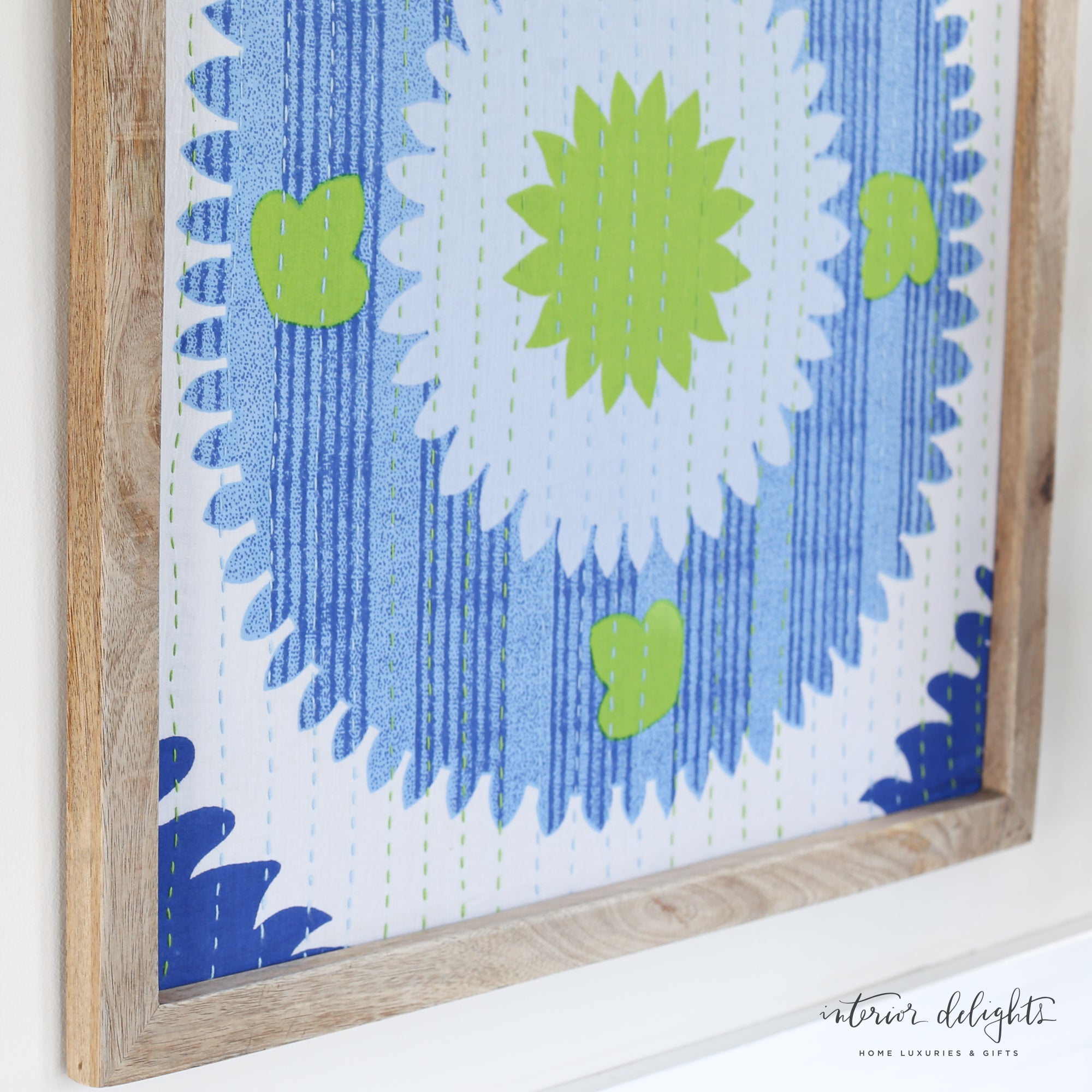 Full view of Blue Suzani Fabric Framed Artwork, adding artistic flair and texture to any wall decor.