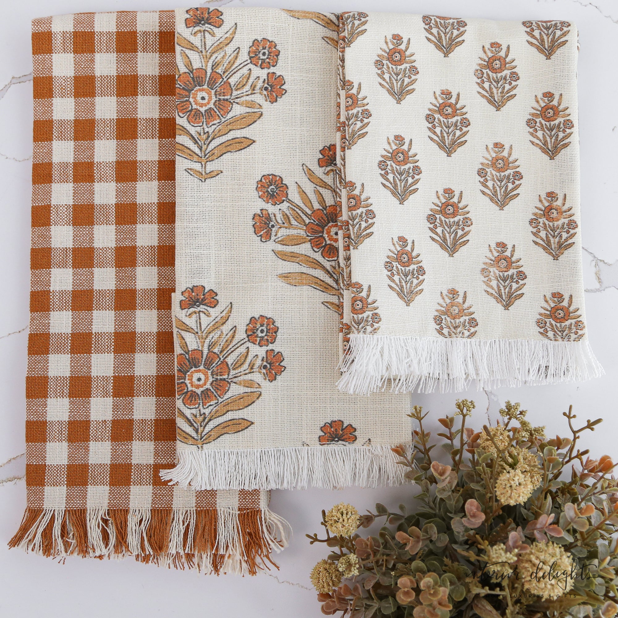 Autumn Block Print Tea Towels set of 3 featuring orange gingham, large floral block print, and small floral motif, adding a cozy touch to your kitchen.