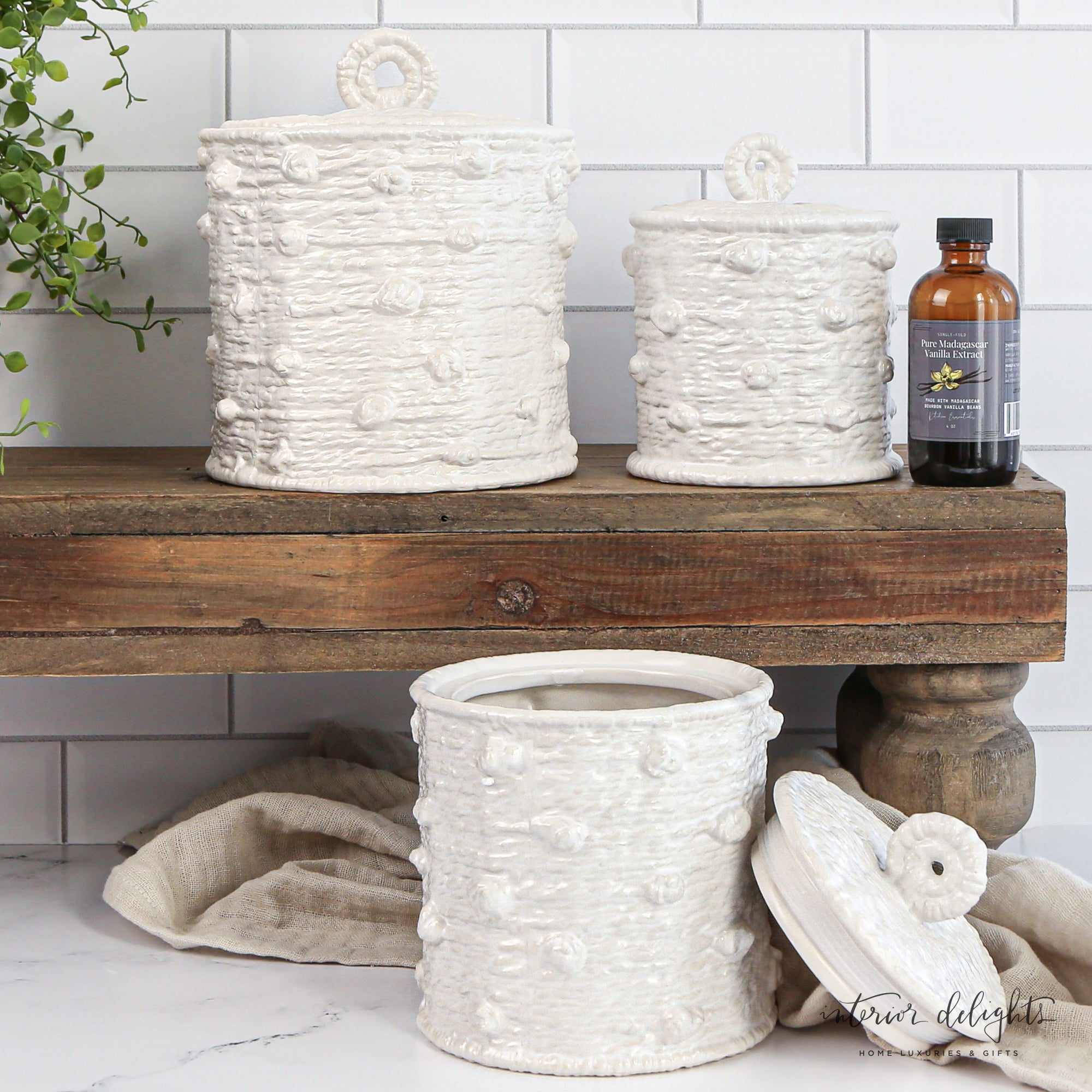 Knotted Canister Set - Medium ceramic canister featuring a timeless woven knot pattern, ideal for bathroom or kitchen essentials.