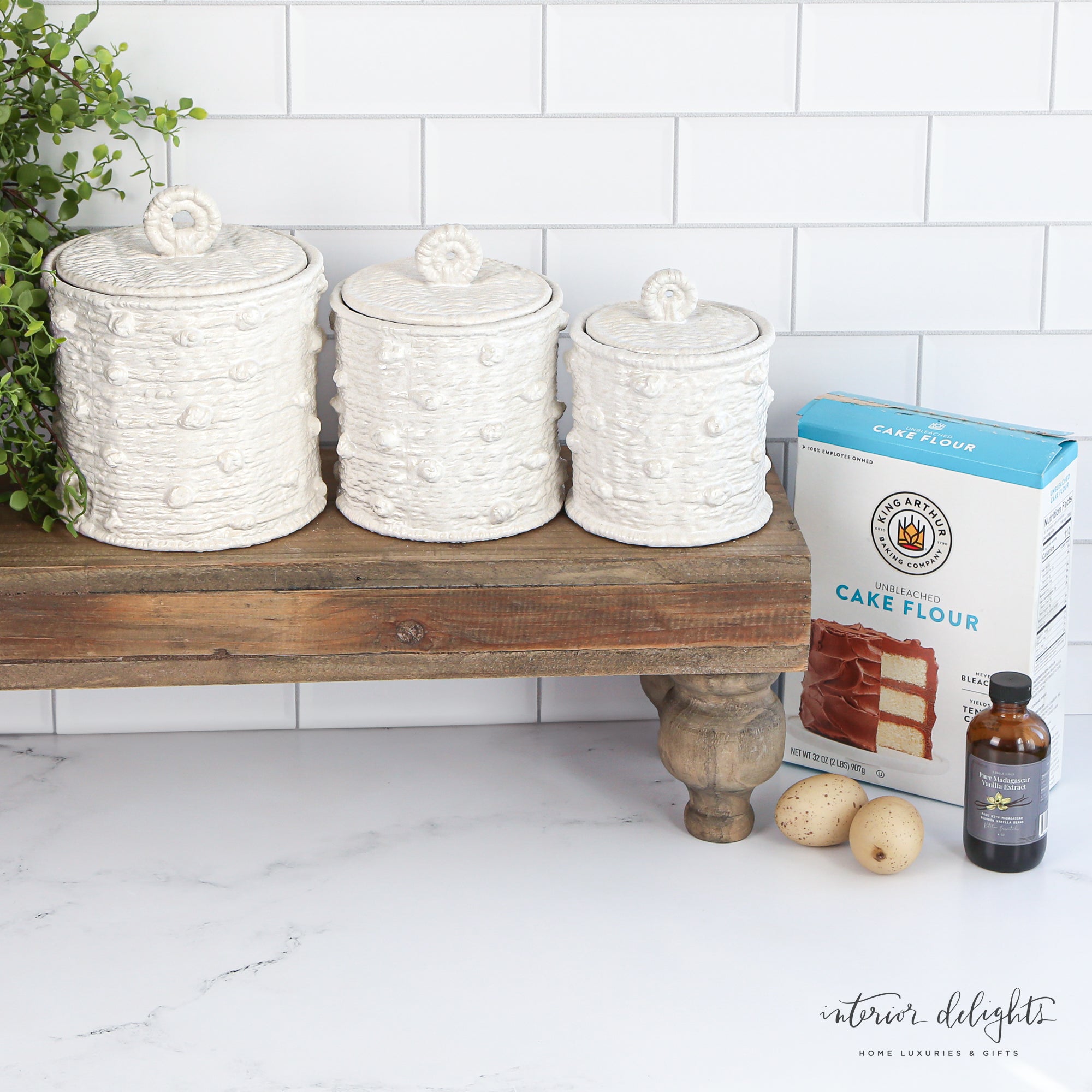 Stylish Knotted Canister Set showcasing a timeless woven knot pattern, ideal for keeping kitchen essentials and bathroom supplies fresh and organized.