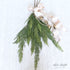30" Cedar Spray elegantly displayed in a modern vase, showcasing its natural greenery and texture.