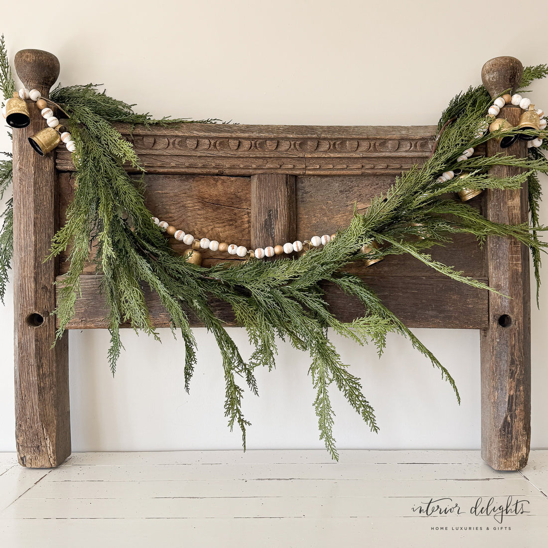 6ft Cedar Garland beautifully draped across a mantel, showcasing its realistic lifelike greenery, perfect for holiday decor.