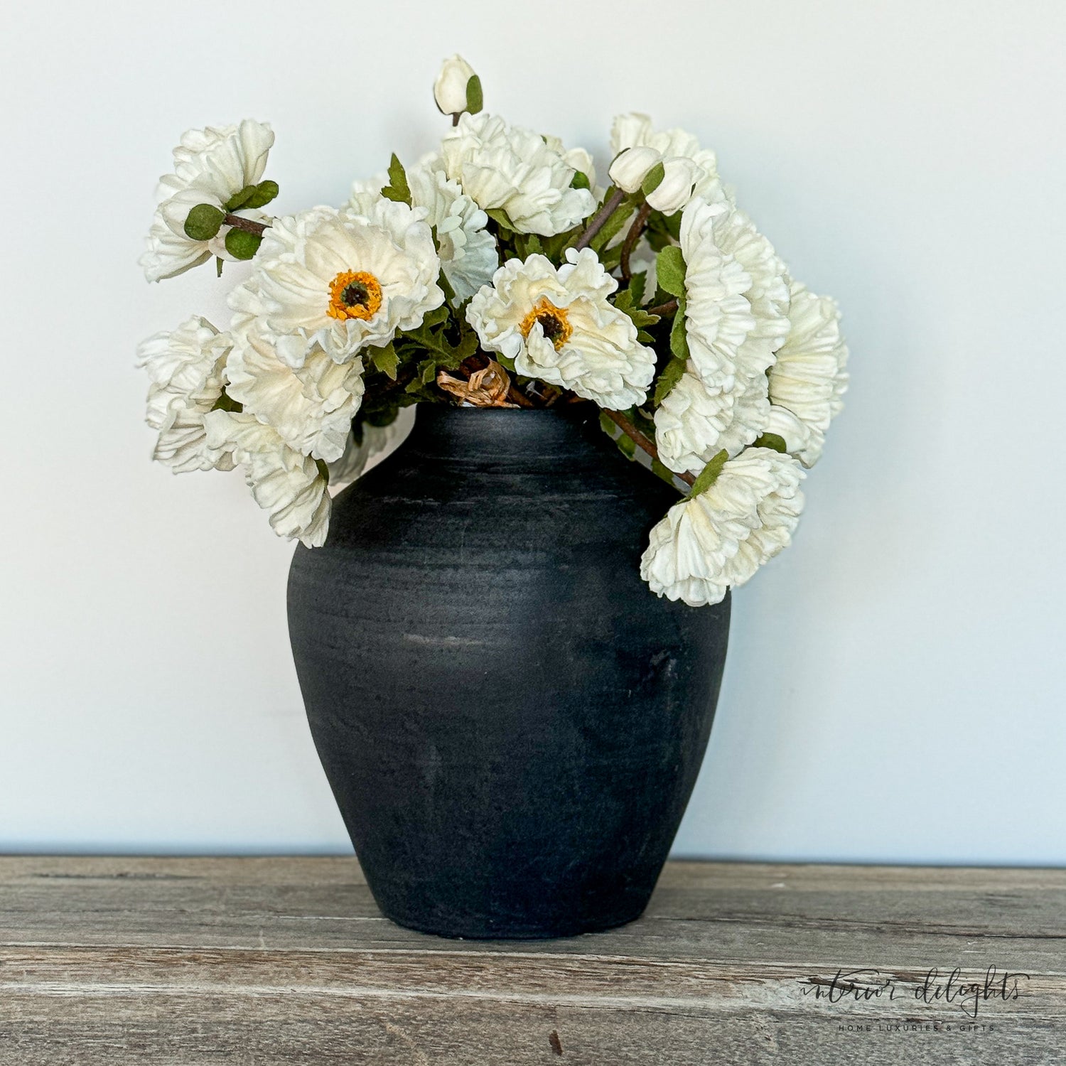 Decorative arrangement featuring the 13" Cream Poppy Bundle in a chic vase.