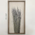 Close-up of a Botanical on Canvas with Wood Frame, showcasing the subtle texture and details of the flowers.
