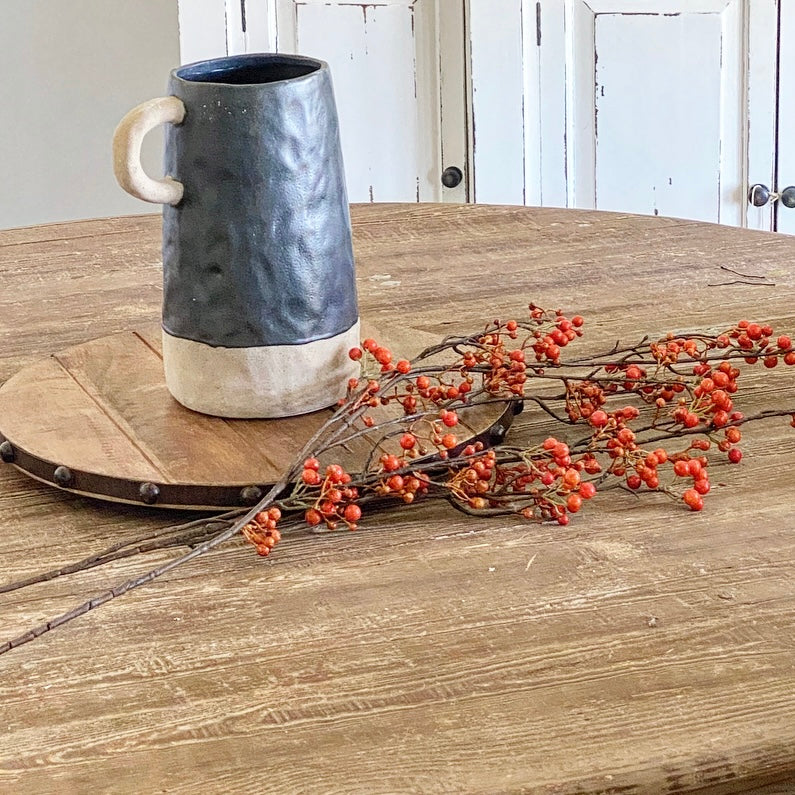 48" Orange Berry Spray decoration, perfect for fall, displayed with organic ceramic vases.
