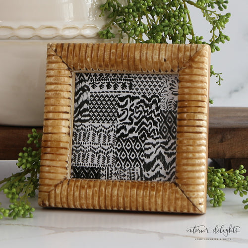 Hand-Carved Photo Frame with Ribbed Pattern showcasing exquisite detail and texture, perfect for displaying cherished memories.