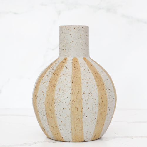 7" Matte Straw Stripe Ceramic Vase showcasing its speckled texture and subtle vertical stripes for a charming cottage decor accent.