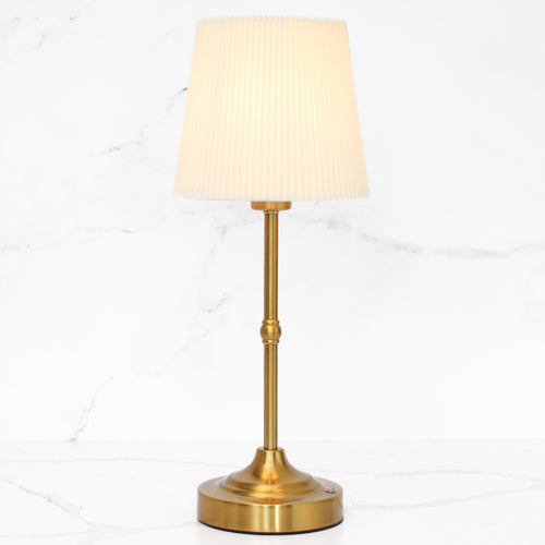Rechargeable Gold LED Tap Lamp with warm ambient glow, featured on a nightstand.
