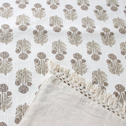 Close-up view of the Taupe Block Print Table Runner showcasing the delicate crochet fringe edges and cotton texture.