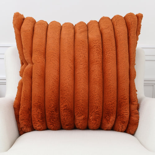 Cozy 24in Orange Faux Fur Pillow adding warmth to autumn decor.