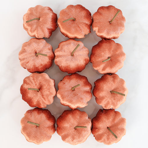 Close-up of Red Rocks Velvet Mini Pumpkins - Set of 12, showcasing the cozy texture and warm color ideal for festive displays.