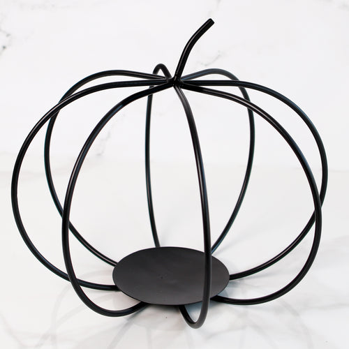 Large Black Metal Pumpkin decorative candle holder with rustic charm, perfect for autumn decor.