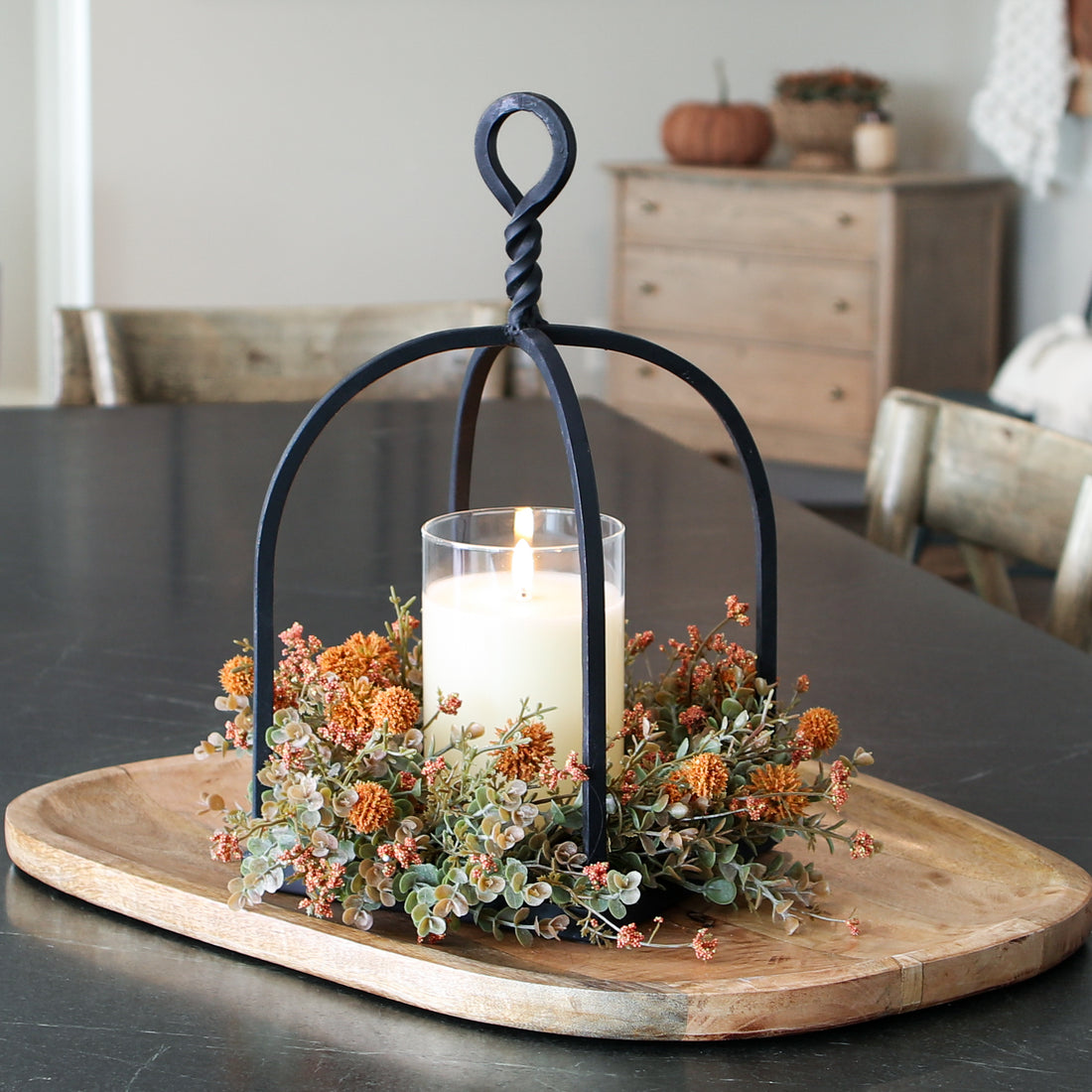 Twisted Top Lantern, a mini black iron lantern perfect for countertops and shelves, adding a cozy glow.