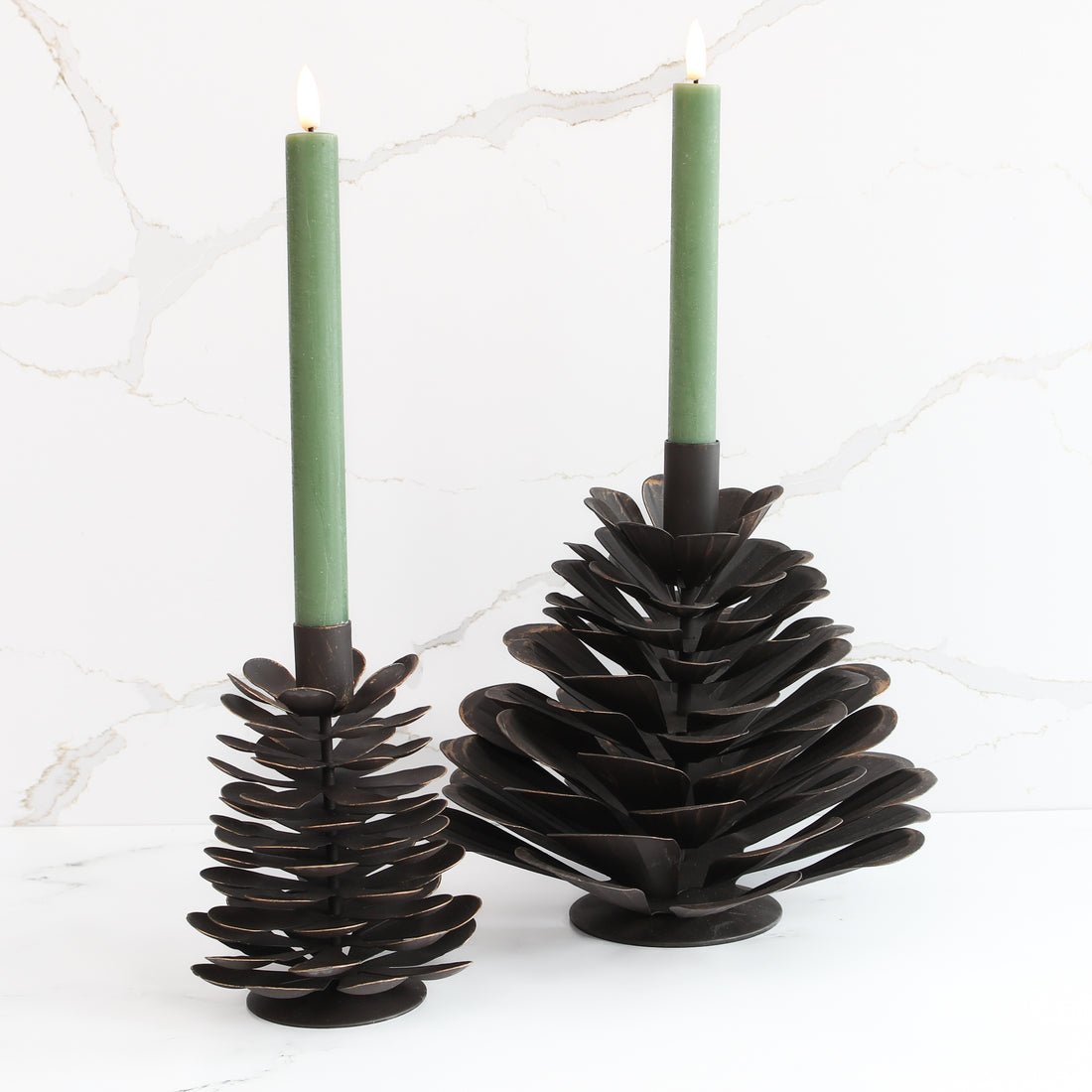 10&quot; LED Taper, Set of 2 Green candles displayed elegantly on a mantel, perfect for seasonal decor.