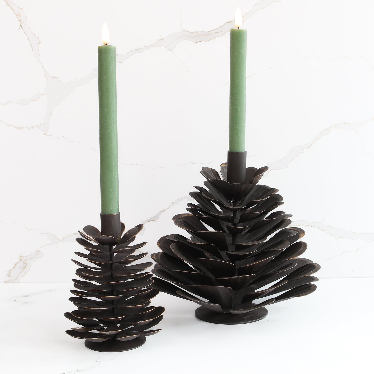 10&quot; LED Taper, Set of 2 Green candles displayed elegantly on a mantel, perfect for seasonal decor.