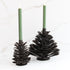 10" LED Taper, Set of 2 Green candles displayed elegantly on a mantel, perfect for seasonal decor.
