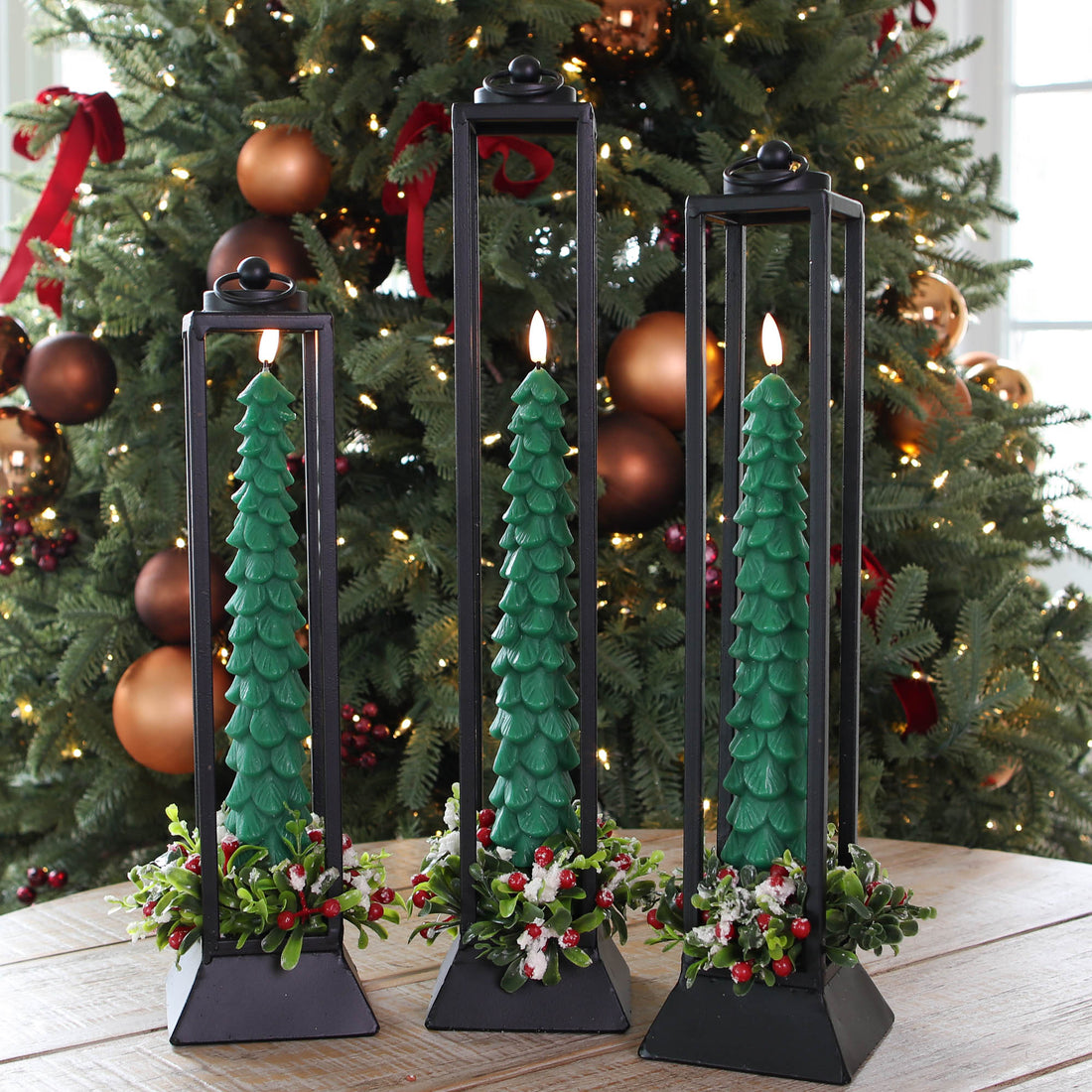 Arrangement: Set of 3 Black Lanterns + Set of 3 Green Tree Tapers + 3 Snowy Boxwood Candle Ring