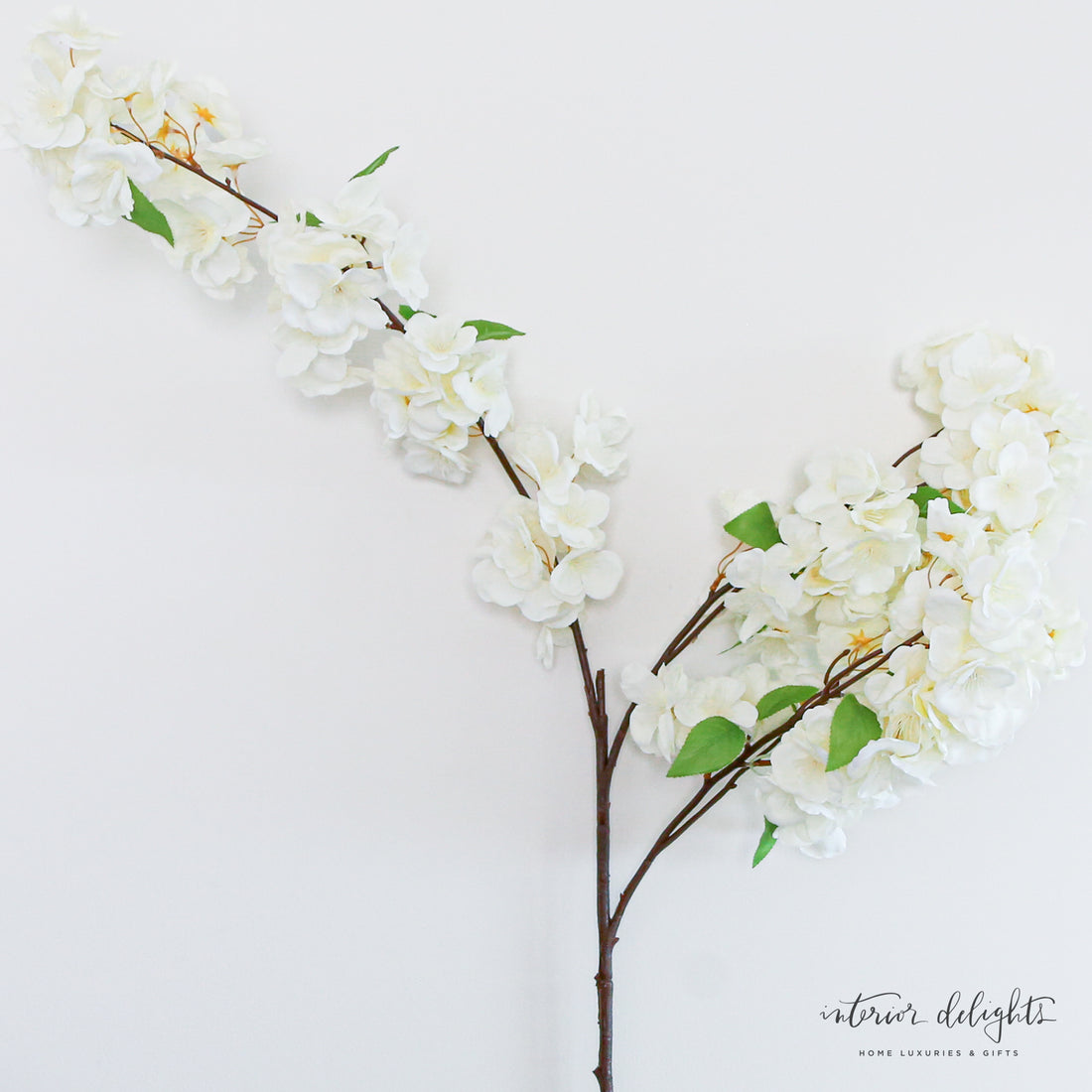 Beautiful Cherry Blossom Spray - 44in featuring delicate white flowers perfect for enhancing interior spaces.