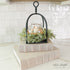 Twisted Top Lantern styled with seasonal candle rings, adding charm to any mantel or accent table.