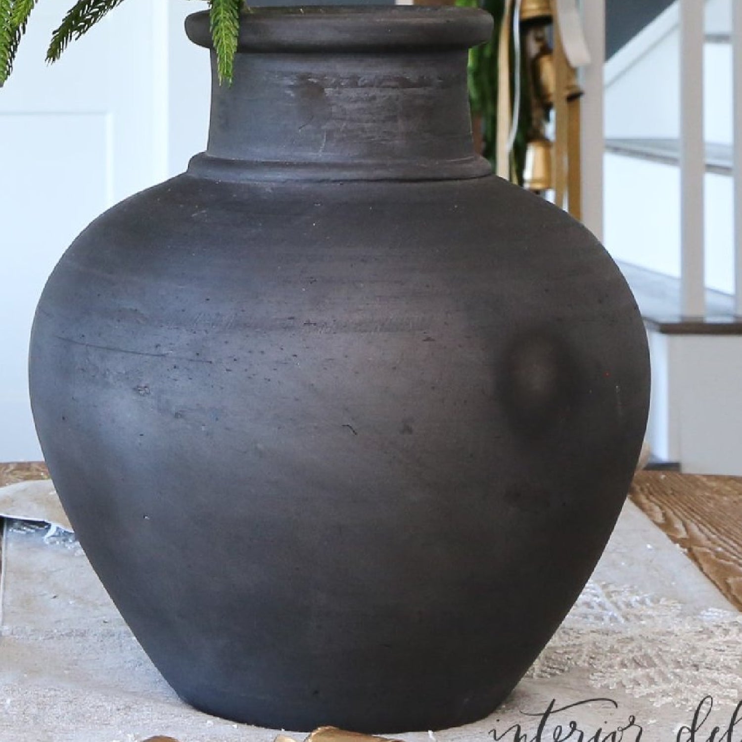 Arrangement: 13.5 in Black Terracotta Vase + Six 35&quot; Snowy Pine Branch With Red Bells
